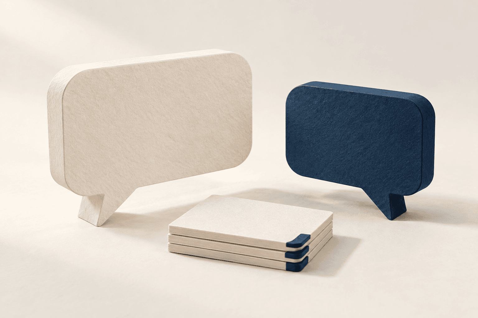 Conceptual illustration of two paper conversation bubbles and training documents.